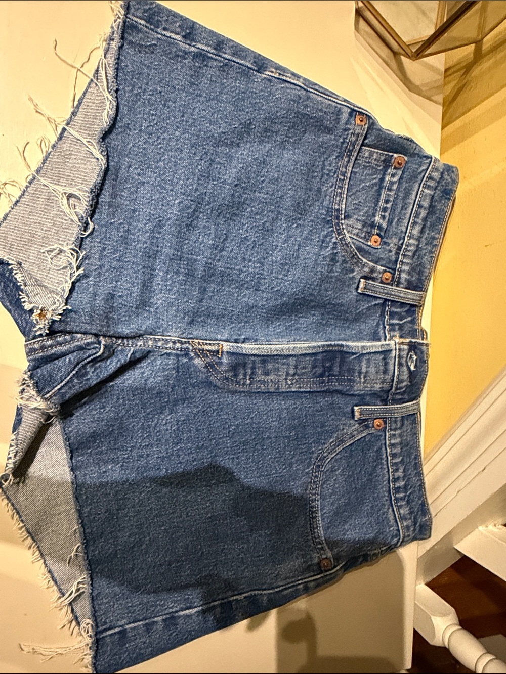 Levi's Medium Blue Distressed Cutoff Denim Shorts